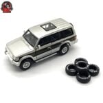 BM Creations 1996 mitsubishi pajero 2nd generation rhd, 1/64 silver with red stripe