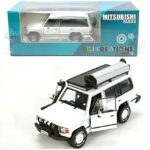 BM Creations 1983 mitsubishi pajero 1st gen. rhd, white with extra accessory so you can make 2 versi