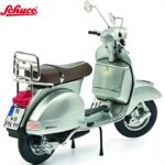 Schuco 1/10 vespa px 125 with luggage carrier 70 years, metallic silver - Image 2