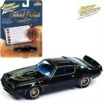 Johnny Lightning 1/64 trivial pursuit 1977 pontiac trans am with poker chip, black with gold trim